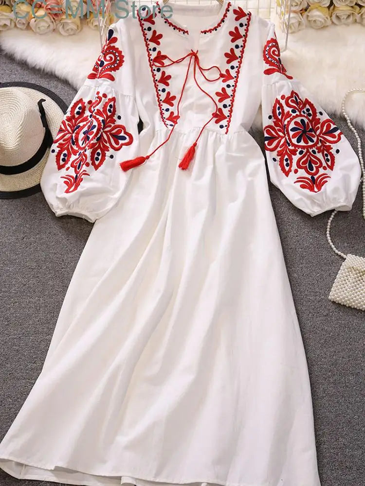 Round neck dress with embroidered sleeves