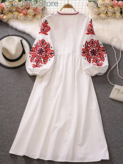 Round neck dress with embroidered sleeves